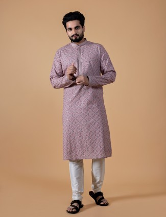 Stunning onion pink silk kurta suit in printed