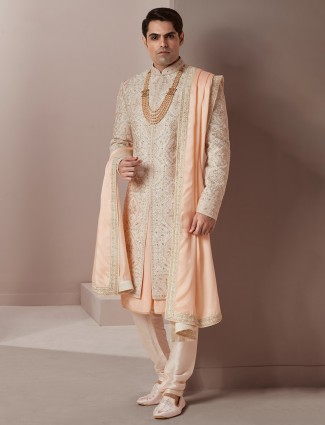 Raw silk sherwani in peach for wedding and groom