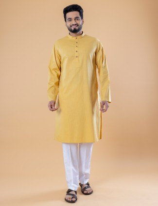 Plain yellow sober kurta suit in cotton