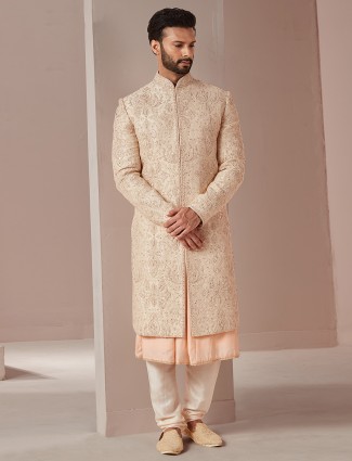 Peach color raw silk groom and wedding sherwani