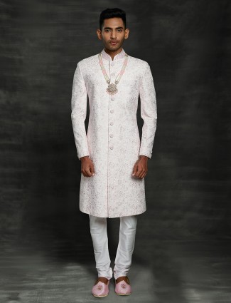 Regal pink sherwani for groom