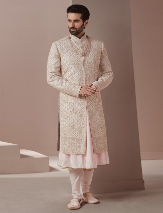 Groom wear raw silk sherwani in baby pink