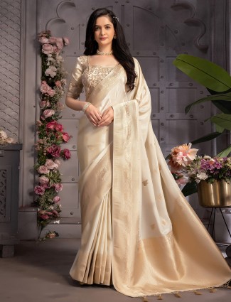 Stunning cream tissue silk saree