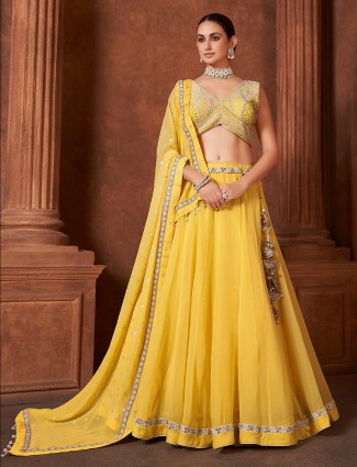 Trendy georgette yellow lehenga choli