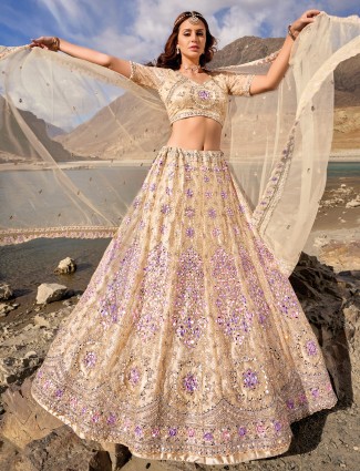 Cream unstitched lehenga choli in net