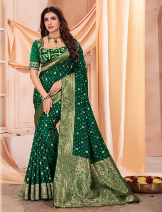 Classy dark green dola silk saree