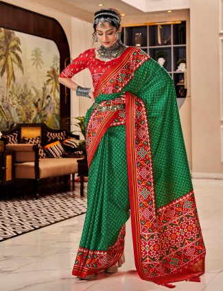 Dark green patola printed tusser silk saree