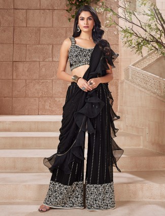 Black palazzo suit with ruffle dupatta