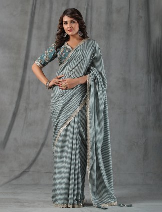 Stone blue printed saree in muslin silk