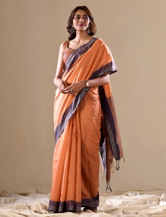 Peach plain saree with contrast border