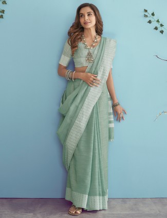 Trendt mint green linen saree