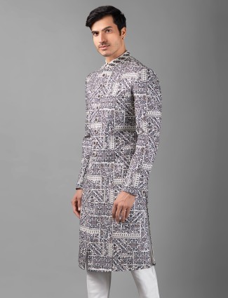 Stunning white embroidery sherwani